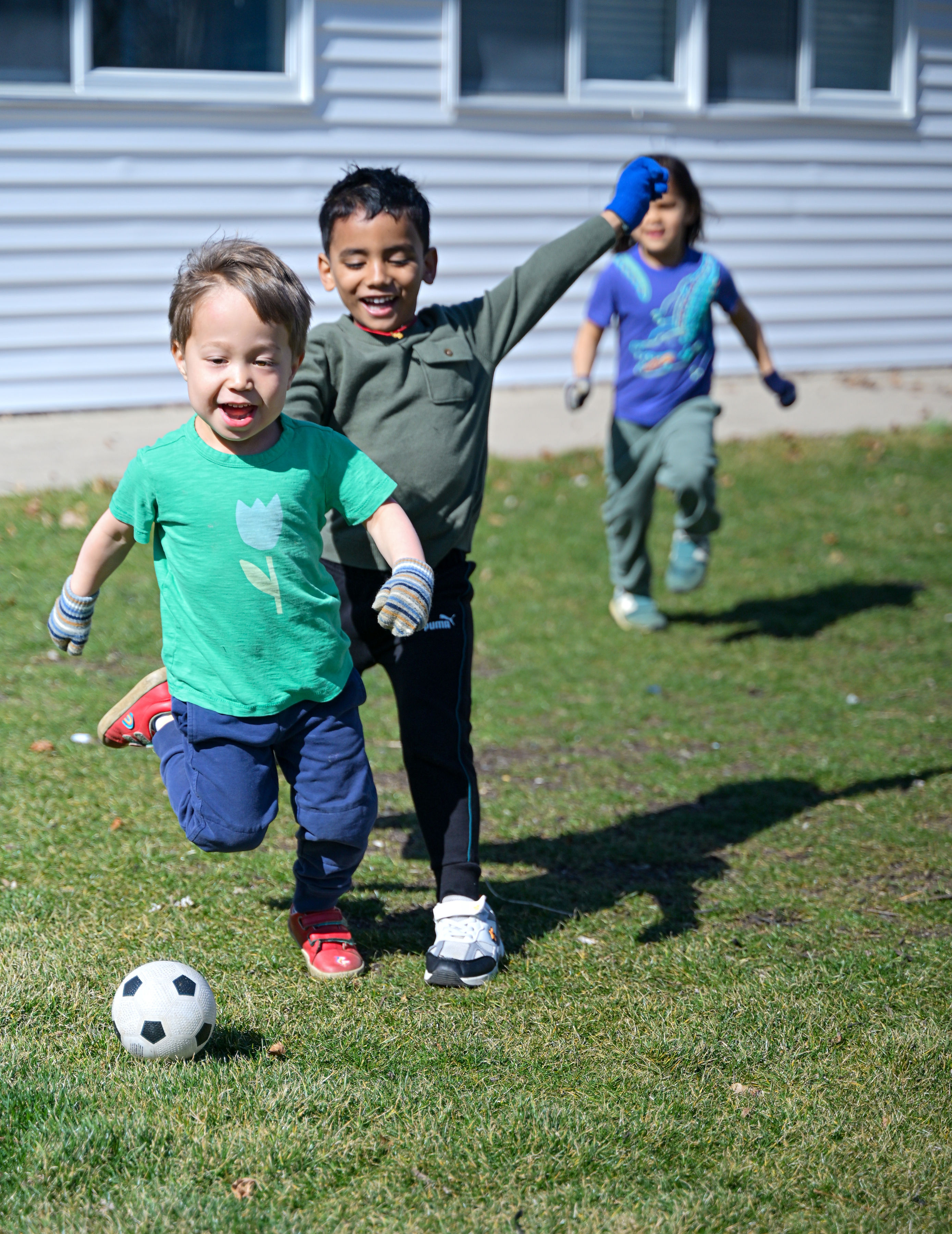 Children playing outdoors at summer camp
